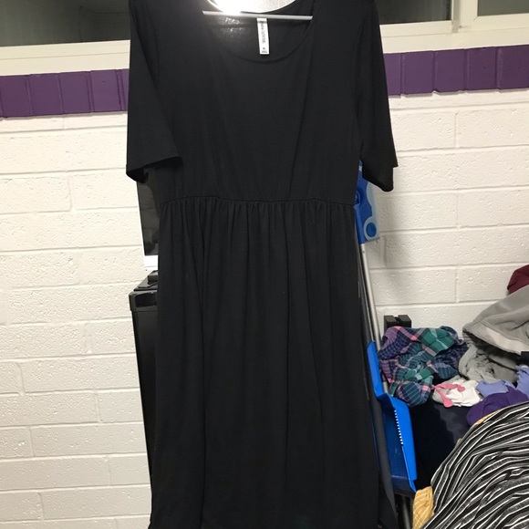 Black dress with pockets - Picture 1 of 2